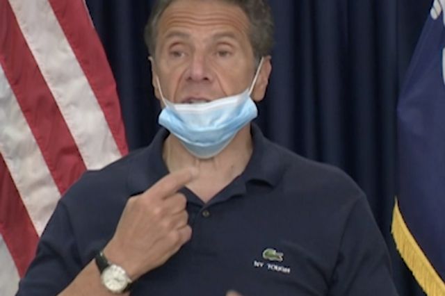 Governor Andrew Cuomo at his Saturday morning press conference shows a face mask covering his chin, demonstrating the wrong way to wear a mask.